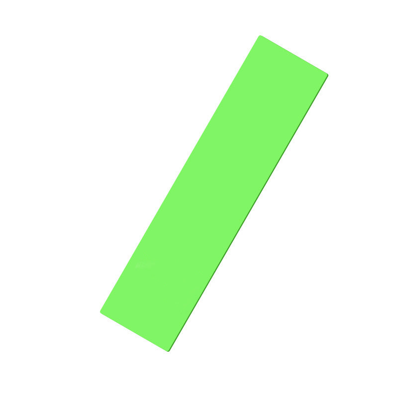 full-body resistance band workout set bright green resistance band for strength and flexibility training.